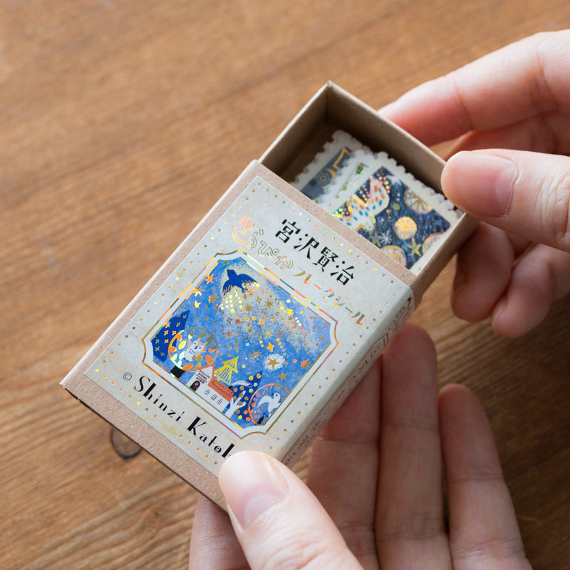 Postage flake stickers in a match box -The cat&