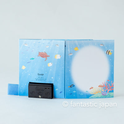 Melody and Light summer card -light in the sea-