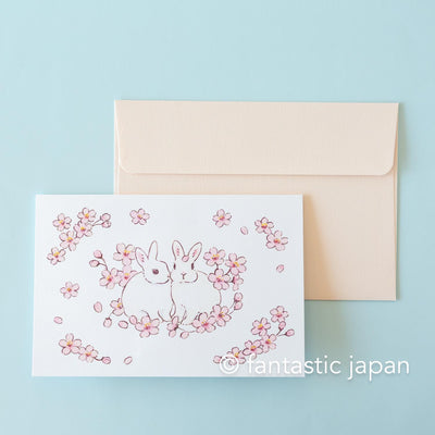 Schinako Moriyama greeting card -Rabbits in the cherry blossoms-