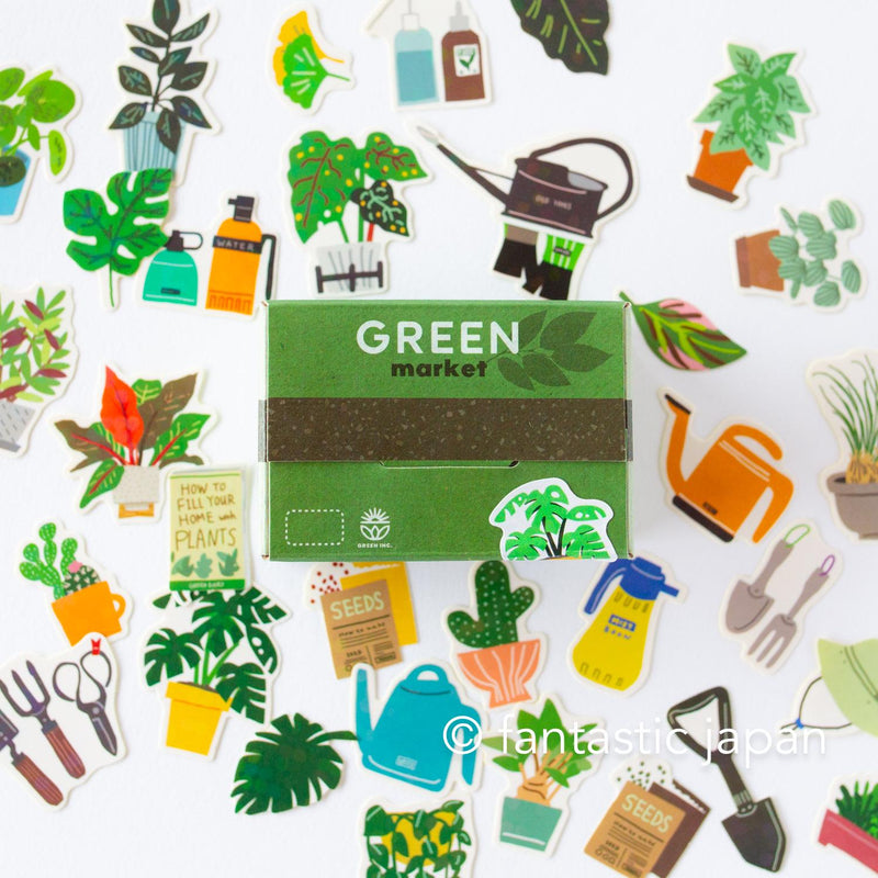 Die-cut hologram flake stickers in a tiny delivery box -green-