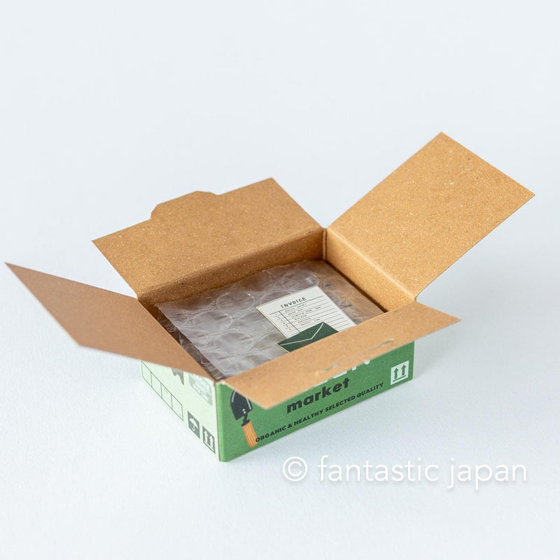 Die-cut hologram flake stickers in a tiny delivery box -green-