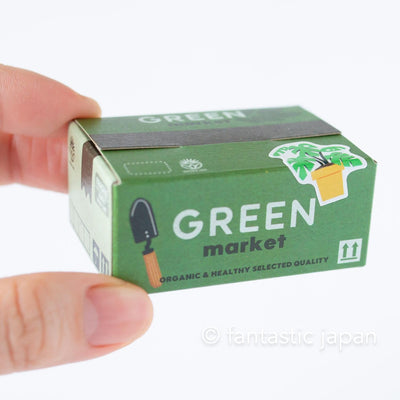 Die-cut hologram flake stickers in a tiny delivery box -green-