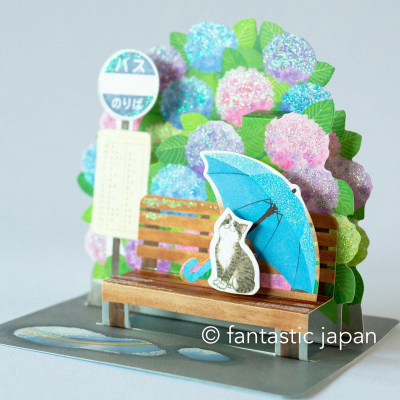 Greeting card -bus stop in the rain-