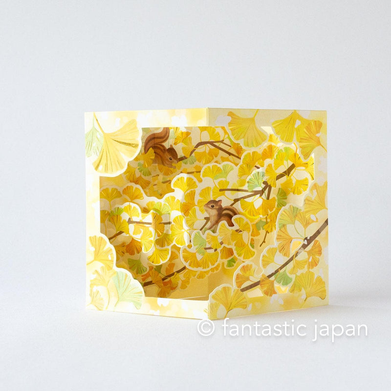 Autumn greeting card -ginkgo tree and  squirrel-