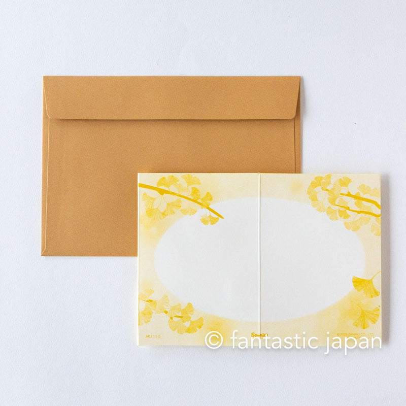 Autumn greeting card -ginkgo tree and  squirrel-