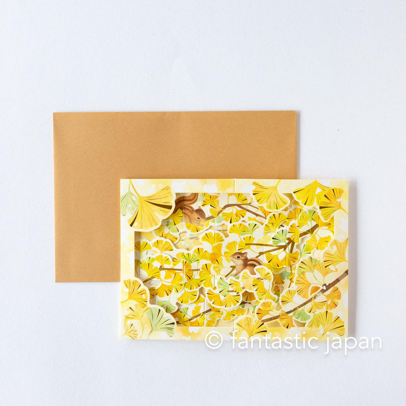Autumn greeting card -ginkgo tree and  squirrel-
