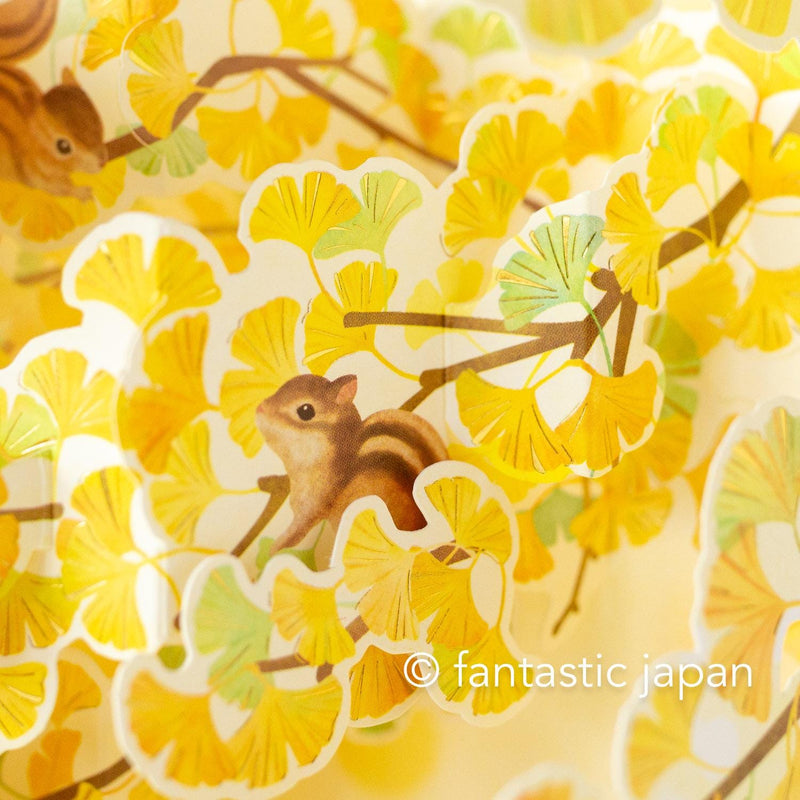 Autumn greeting card -ginkgo tree and  squirrel-