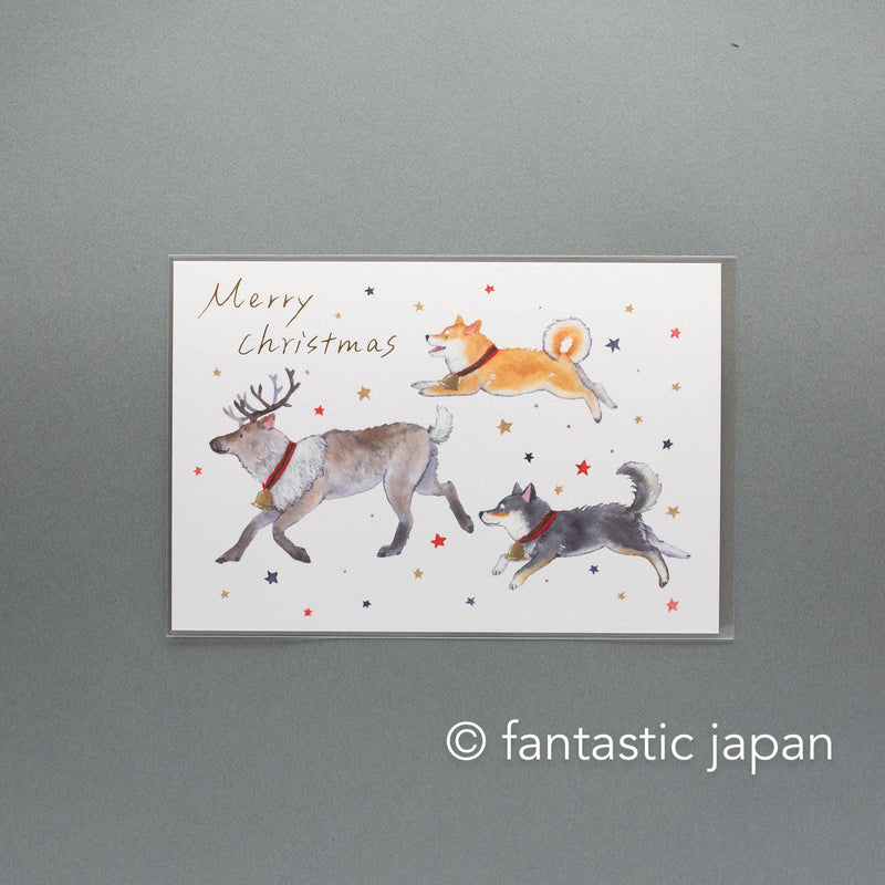 Murata Natsuka post card -Shiba Inu in a Christmas Stocking-