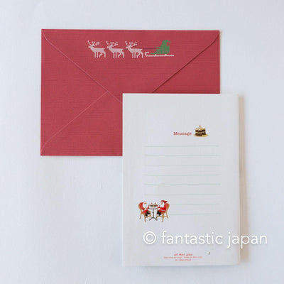 Christmas pop up card -Santa Clauses in the candy shop-