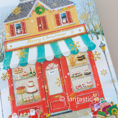 Christmas pop up card -Santa Clauses in the candy shop-