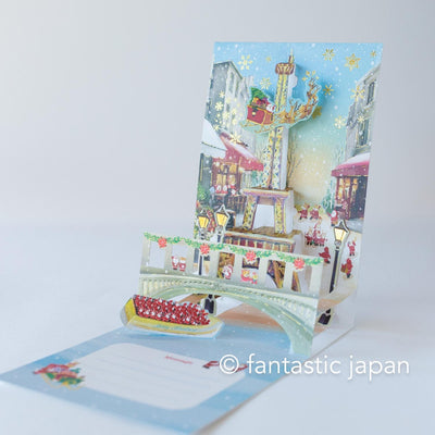 Christmas pop up card -Santa Clauses in Paris-