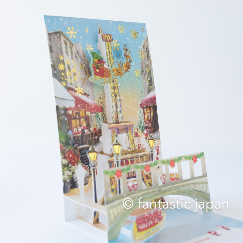 Christmas pop up card -Santa Clauses in Paris-
