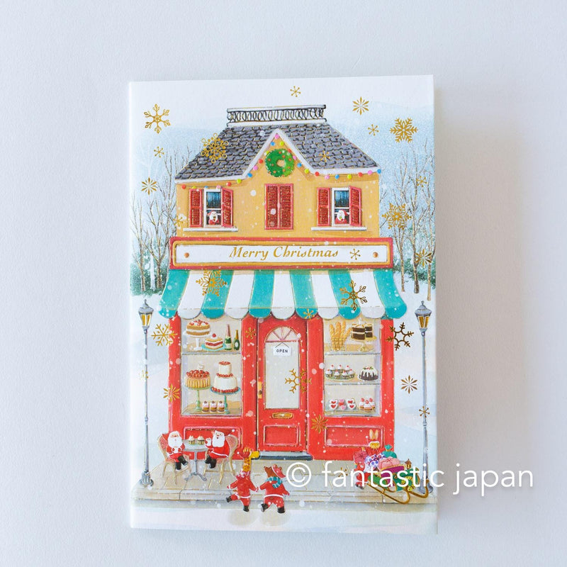 Christmas pop up card -Santa Clauses in the candy shop-