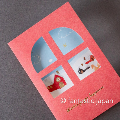 Greeting card with window -A snowy landscape and a cottage-