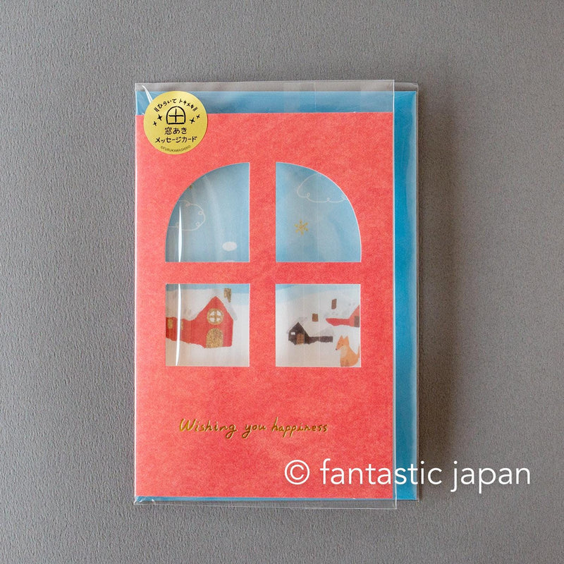 Greeting card with window -A snowy landscape and a cottage-