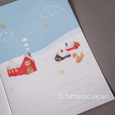 Greeting card with window -A snowy landscape and a cottage-