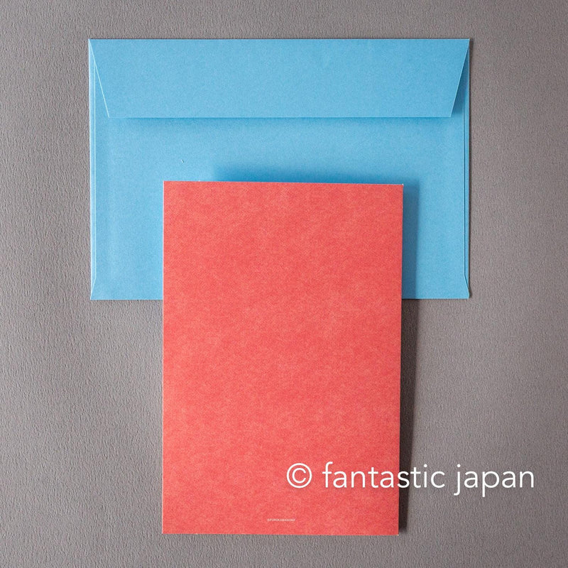 Greeting card with window -A snowy landscape and a cottage-