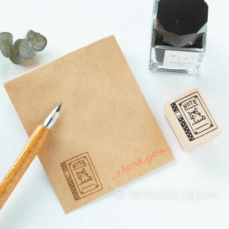 Pottering cat stamp small -notebook-