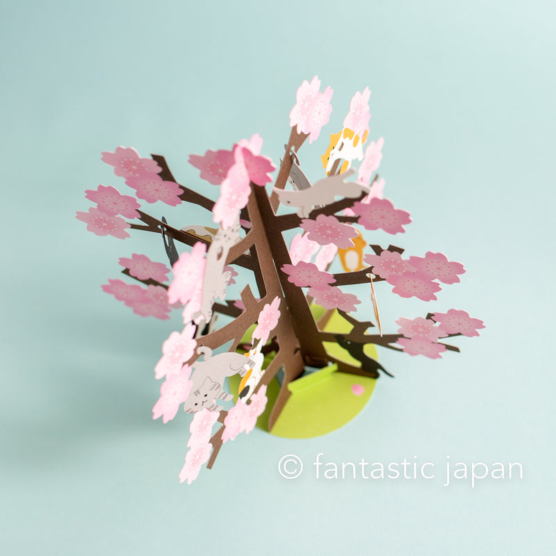 Greeting card "Spring greeting -cat playing on the cherry blossom tree-