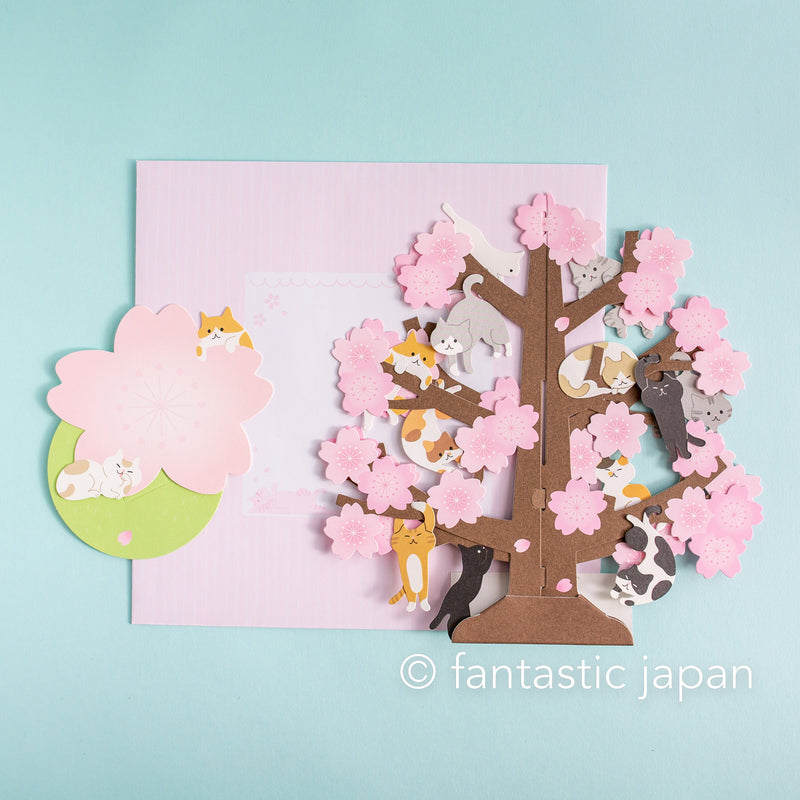 Greeting card "Spring greeting -cat playing on the cherry blossom tree-