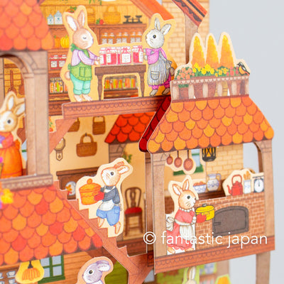 Autumn greeting card -rabbits house-
