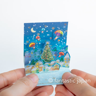 Christmas tiny pop up card -mini mini Santa Clauses parachuting into town-