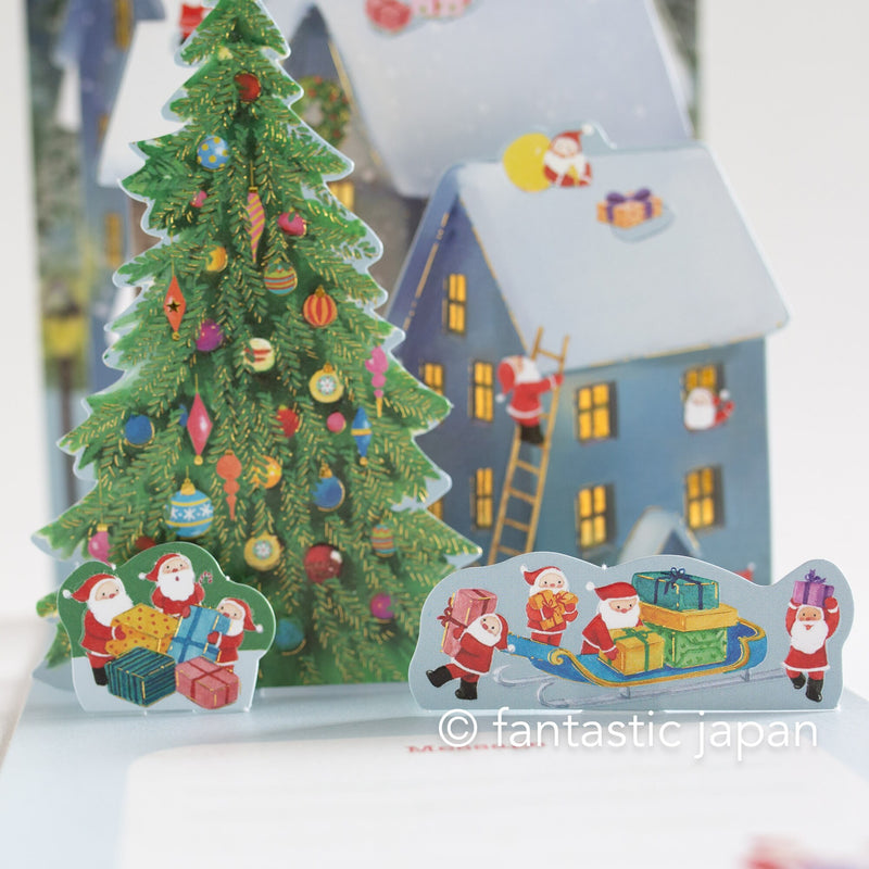 Christmas pop up card -Santa Clauses on the roof-