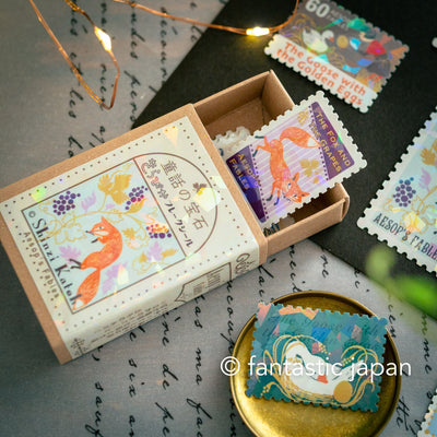 Postage flake stickers in a match box -Aesop's Fairy Tales 1 -