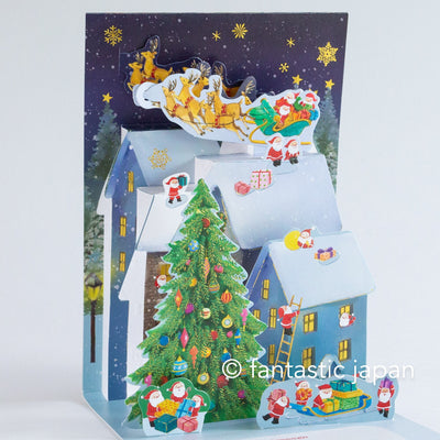 Christmas pop up card -Santa Clauses on the roof-