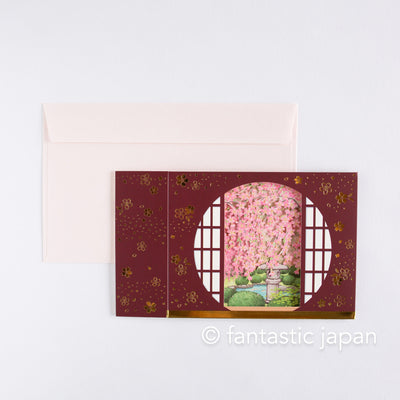 Greeting card -cherry blossoms in the Japansese circle window-