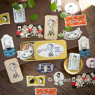 Flake stickers in a small tin box / Alice's Adventures in Wonderland -OPEN THE DOOR- by Shinzi Katoh