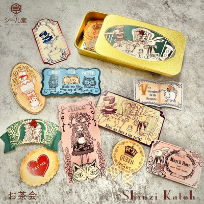 Flake stickers in a small tin box / Alice's Adventures in Wonderland -tea party- by Shinzi Katoh